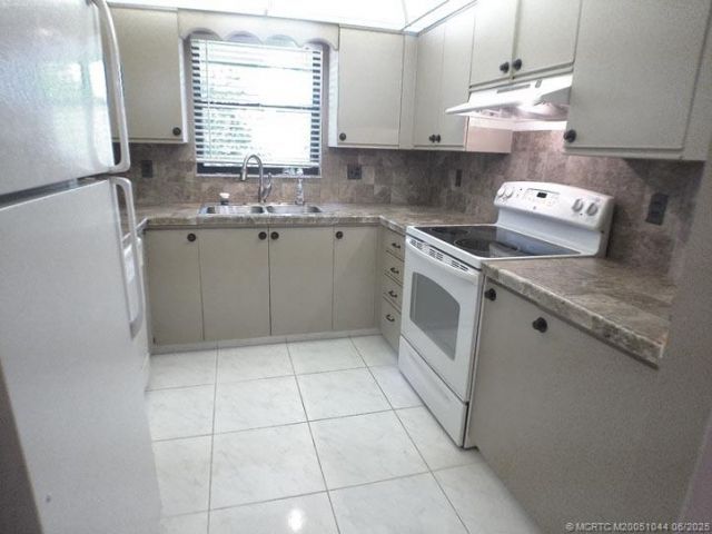 360 SW South River Drive, Unit 205, Stuart, FL 34997 Photo