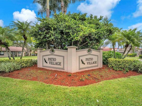 566 VILLAGE LAKE DRIVE, Weston, FL 33326