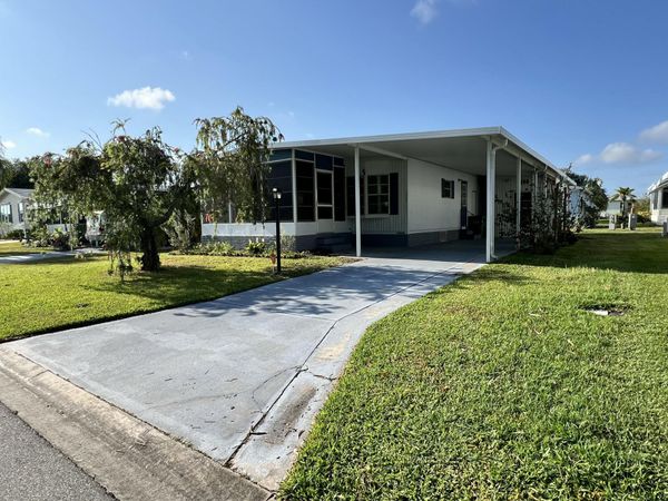 1005 Thrush Circle, Barefoot Bay, FL 32976