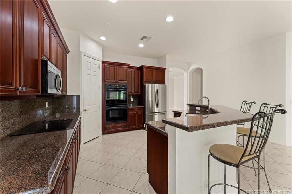 879 SW Pebble Lane, Palm City, FL 34990 Photo