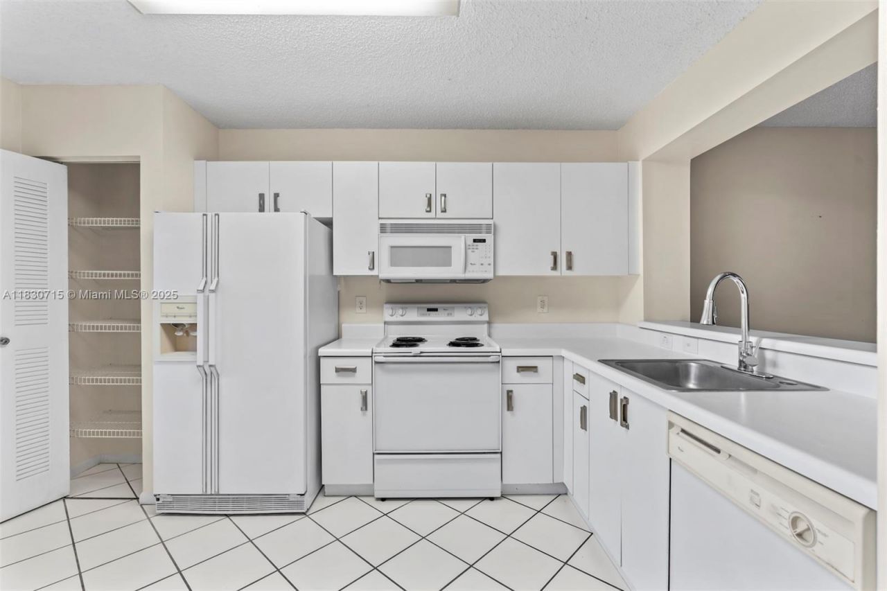 9511 Weldon Cir, Unit G406, Tamarac, FL 33321 Photo