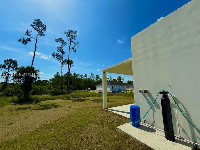 323 Mangonia Ave, Lehigh Acres, FL 33974 Photo