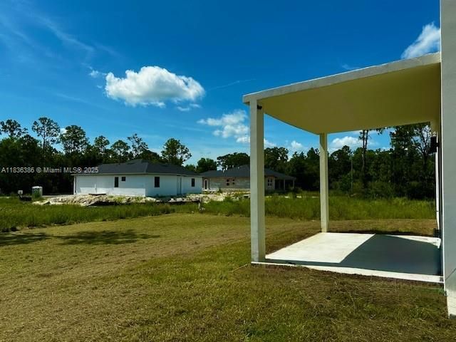 323 Mangonia Ave, Lehigh Acres, FL 33974 Photo