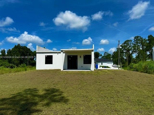 323 Mangonia Ave, Lehigh Acres, FL 33974 Photo