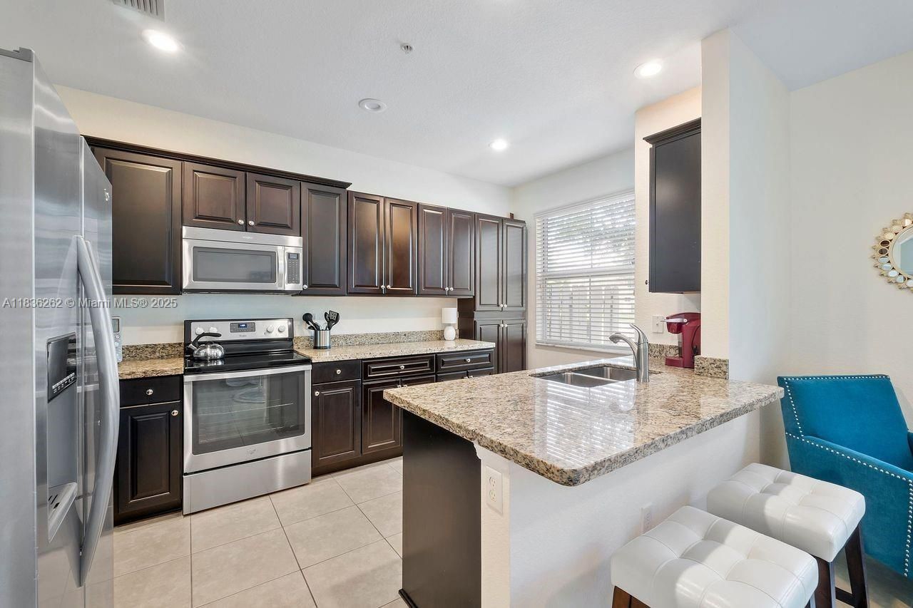 2851 W Prospect Rd, Unit 1306, Tamarac, FL 33309 Photo