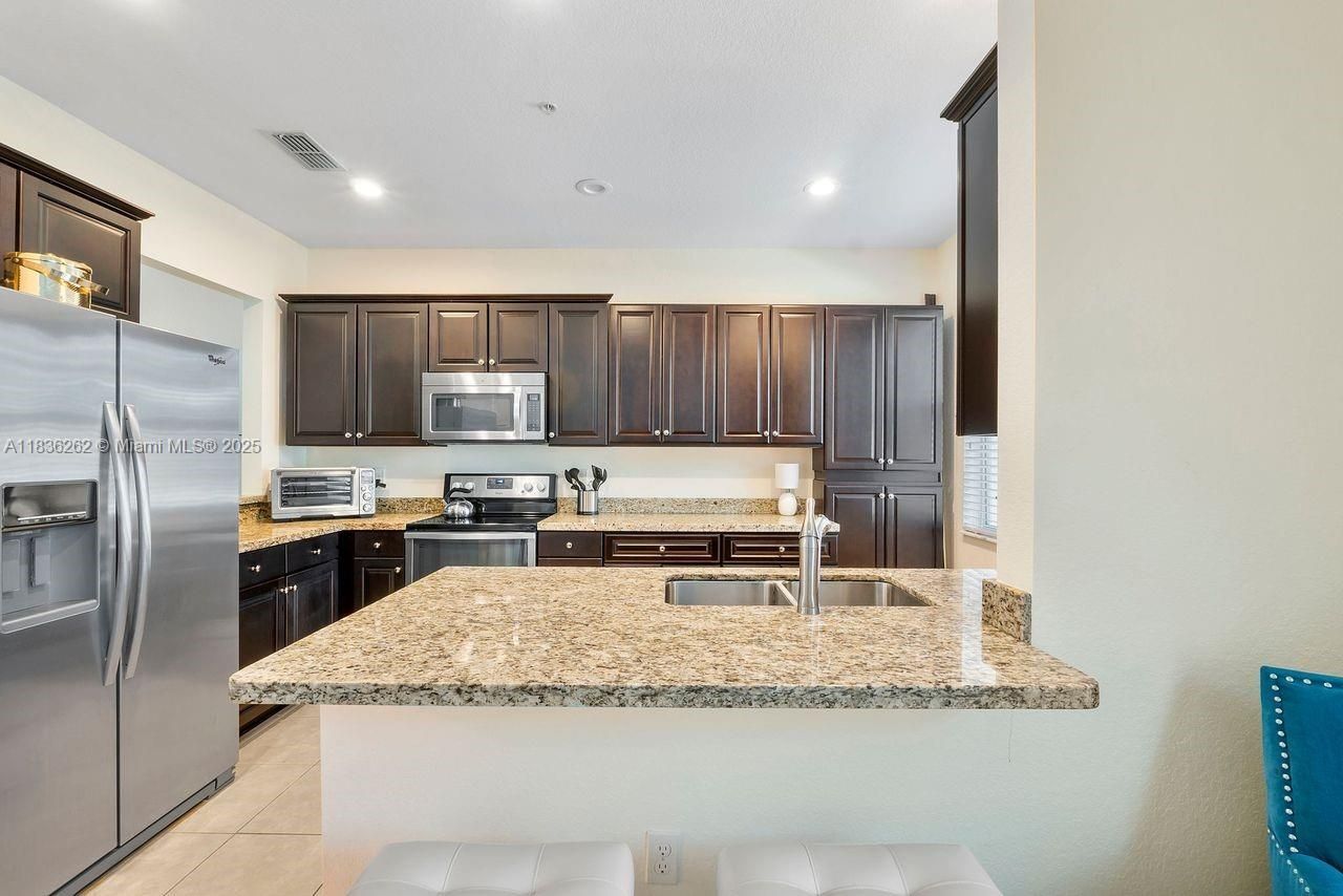 2851 W Prospect Rd, Unit 1306, Tamarac, FL 33309 Photo