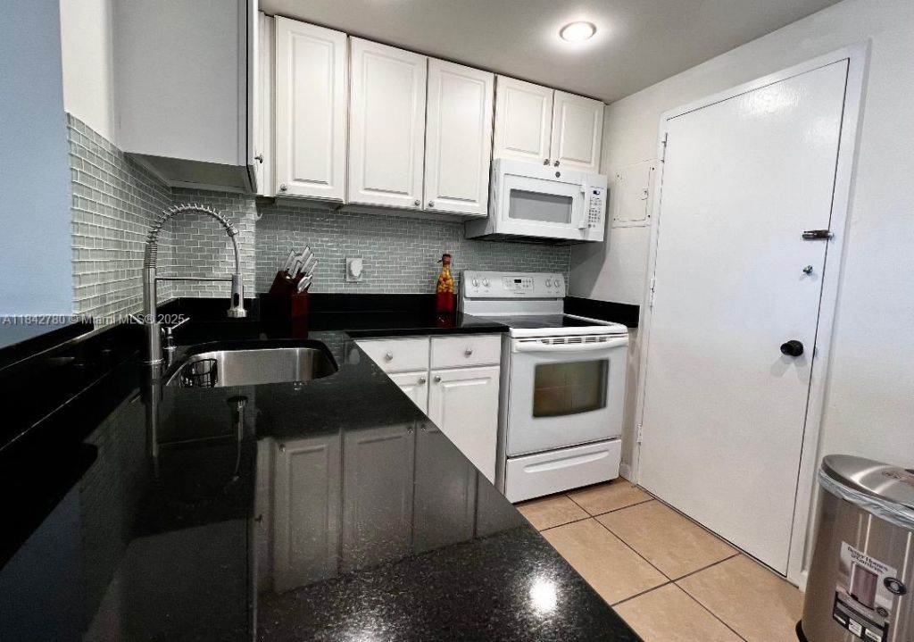 401 Golden Isles Dr, Unit 1011, Hallandale Beach, FL 33009 Photo