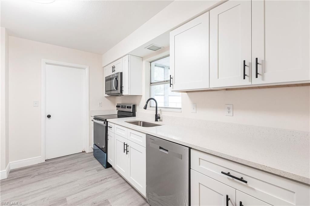 818 Gardenside Ct, Lehigh Acres, FL 33936 Photo