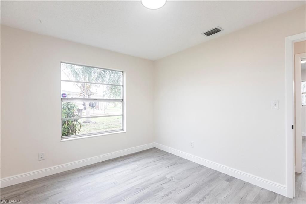 818 Gardenside Ct, Lehigh Acres, FL 33936 Photo