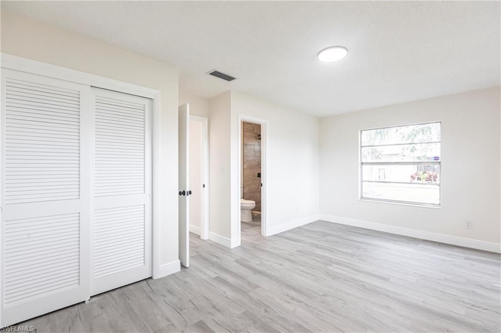 818 Gardenside Ct, Lehigh Acres, FL 33936 Photo