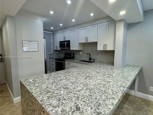 8437 Forest Hills Drive, Unit 103, Coral Springs, FL 33065