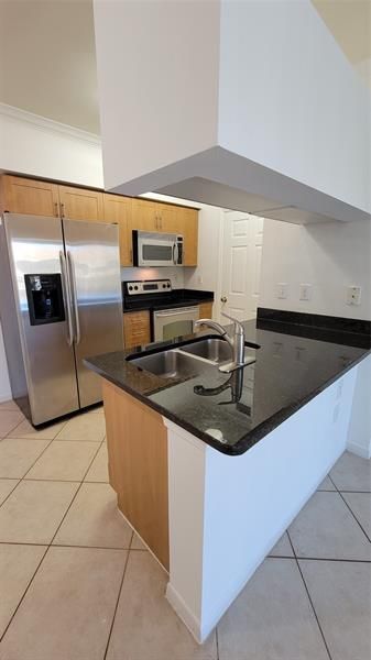 6565 Emerald Dunes Drive, Unit 303, West Palm Beach, FL 33411 Photo