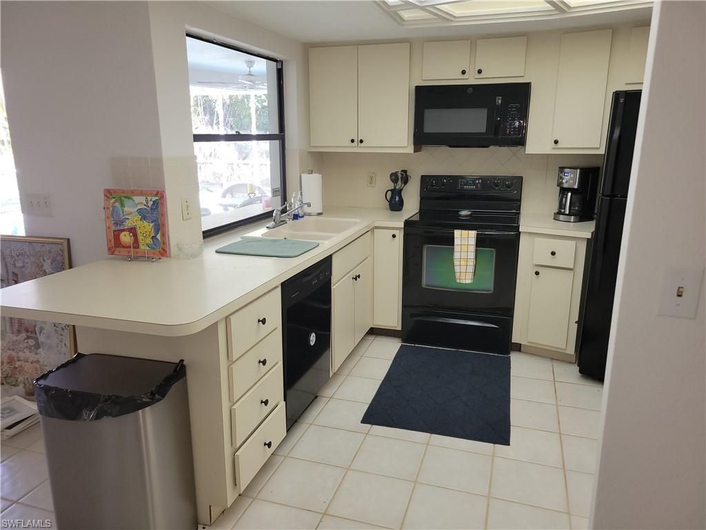 735 High Pines Dr, Naples, FL 34103 Photo