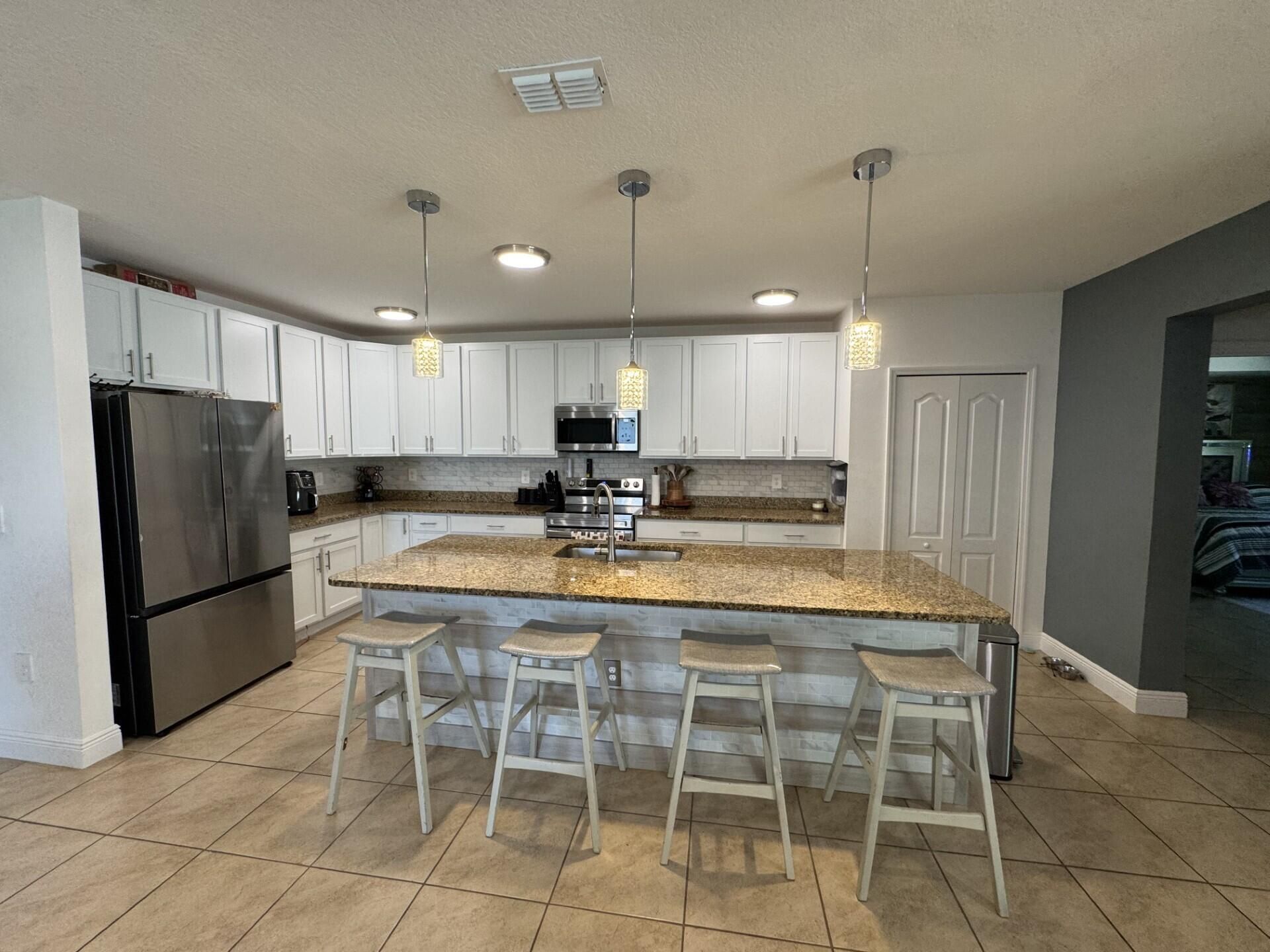 5252 NW East Piper Circle, Port Saint Lucie, FL 34986 Photo