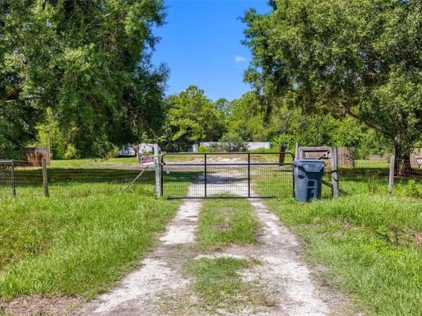 3207 CYPRESS TRAILS DRIVE, POLK CITY, FL 33868