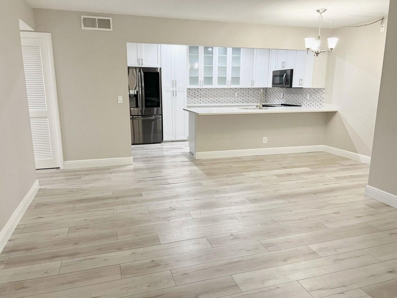 1006 Green Pine Boulevard, Unit A1, West Palm Beach, FL 33409 Photo