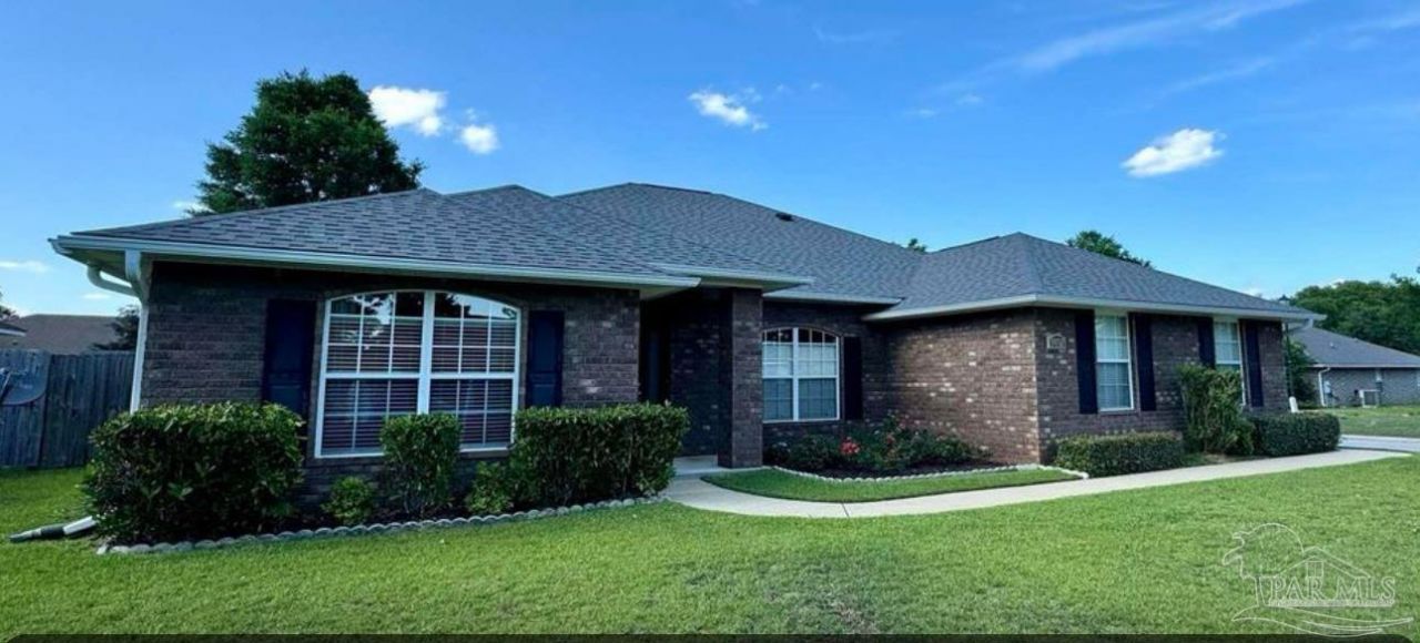 5672 Tiger Woods Dr, Milton, FL 32570 Main Photo