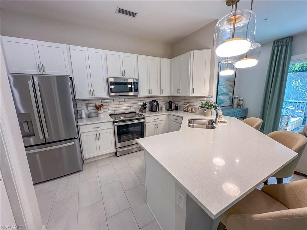 232 Indies Dr E, Unit 201, Naples, FL 34114 Photo