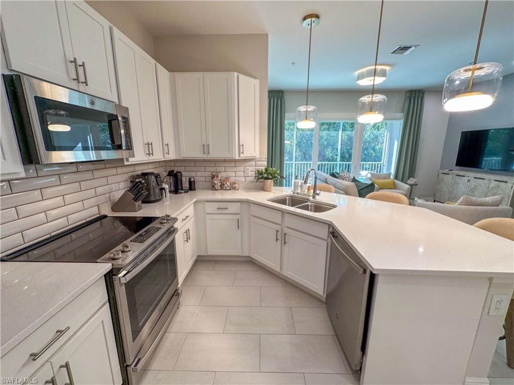 232 Indies Dr E, Unit 201, Naples, FL 34114 Photo