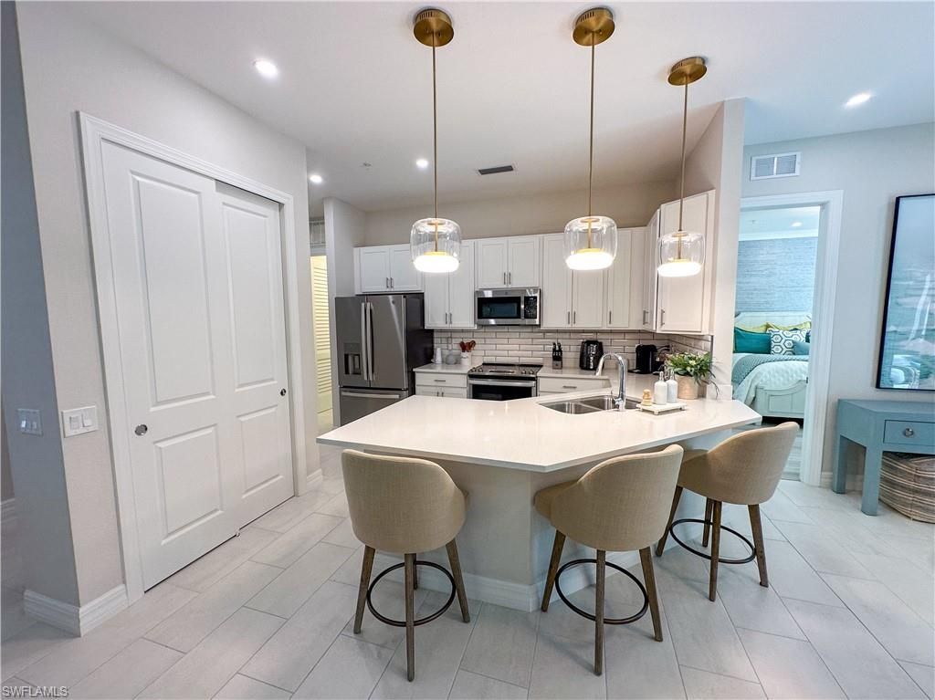 232 Indies Dr E, Unit 201, Naples, FL 34114 Photo