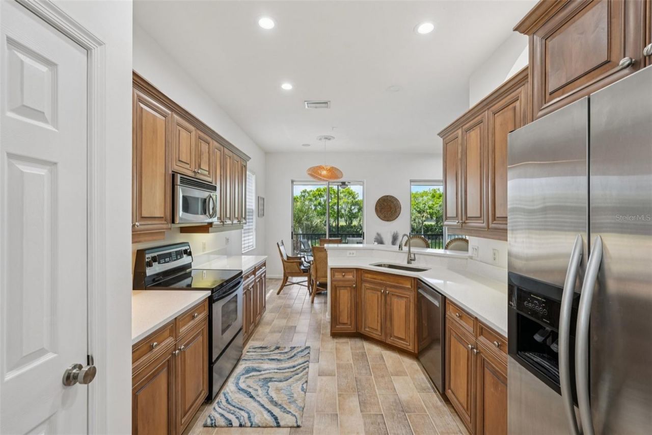 10100 Valiant Court, Unit 201, Miromar Lakes, FL 33913 Photo