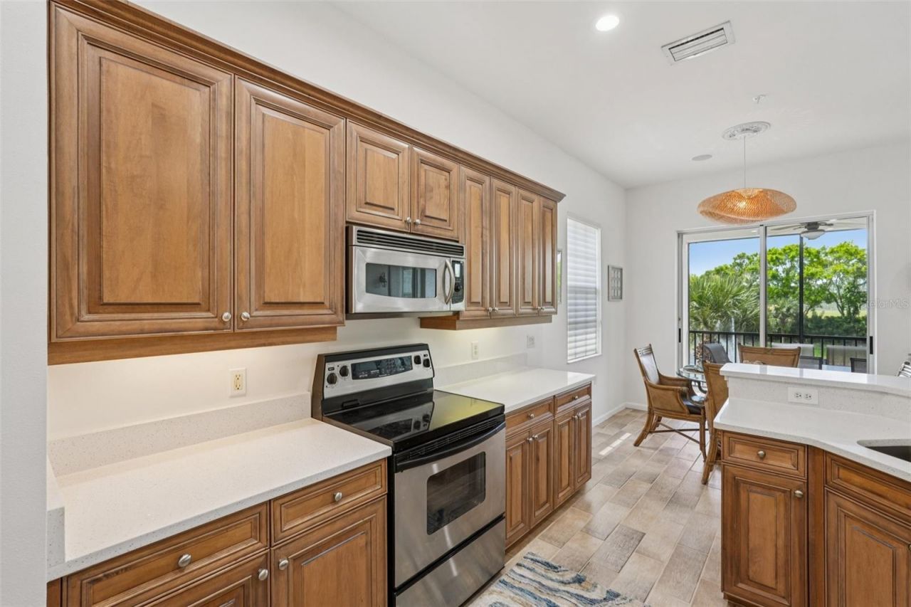 10100 Valiant Court, Unit 201, Miromar Lakes, FL 33913 Photo