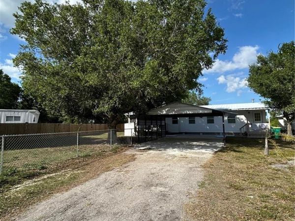 5522 SWAYING PALM DRIVE, PUNTA GORDA, FL 33982