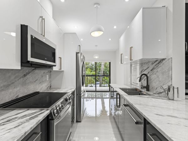 11311 Pond View Drive, Unit C203, Wellington, FL 33414