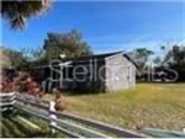 809 N JOHN YOUNG PARKWAY, KISSIMMEE, FL 34741