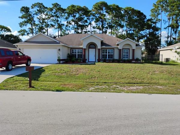1331 SW Ingrassina Avenue, Port St. Lucie, FL 34953