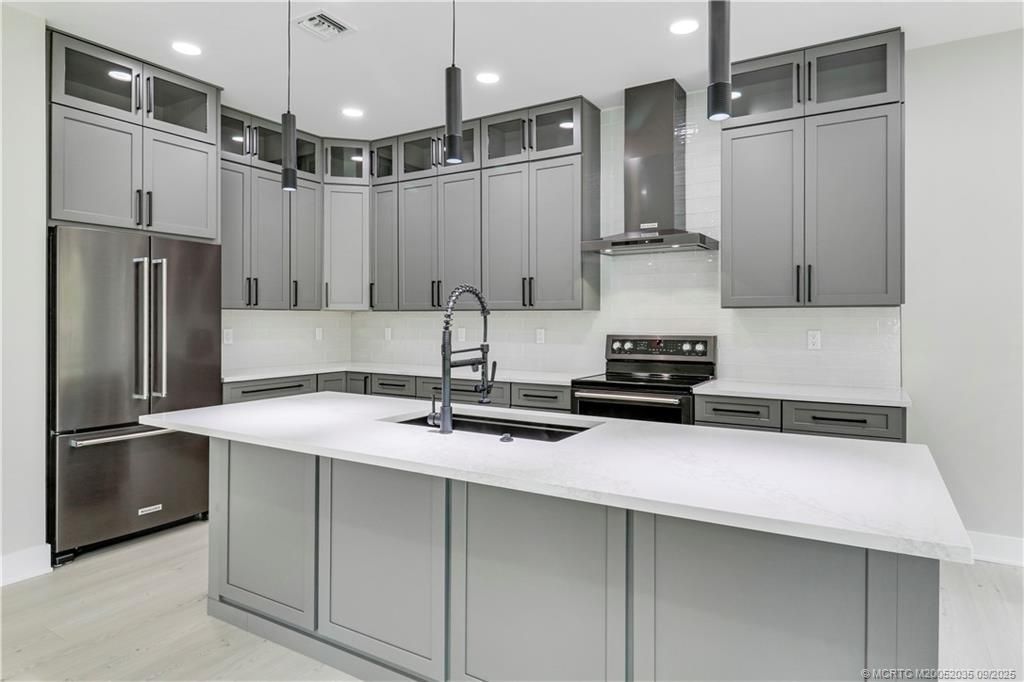 1023 NE Orange Avenue, Jensen Beach, FL 34957 Photo