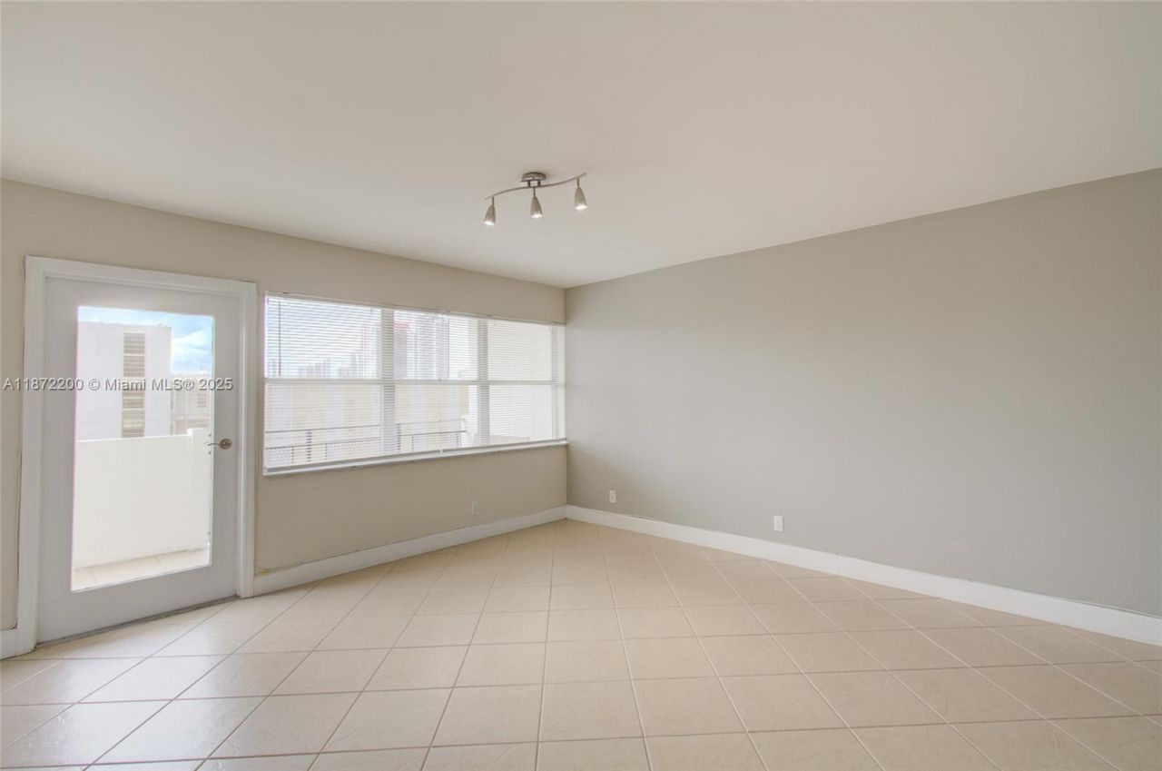 401 Golden Isles Dr, Unit 702, Hallandale Beach, FL 33009 Photo