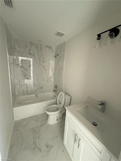 140/142 Gilbert Ave S, Lehigh Acres, FL 33973 Photo