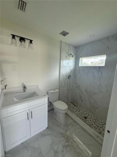 140/142 Gilbert Ave S, Lehigh Acres, FL 33973 Photo