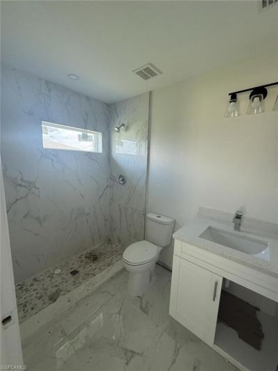 140/142 Gilbert Ave S, Lehigh Acres, FL 33973 Photo