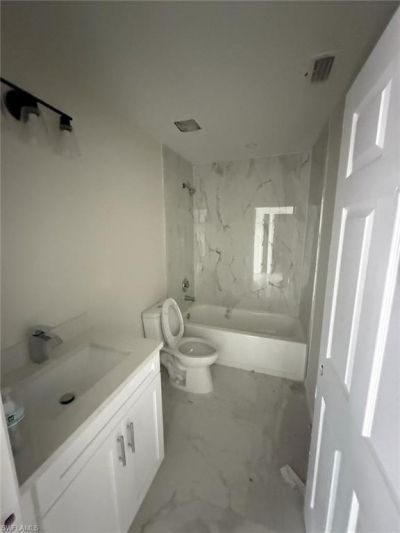 140/142 Gilbert Ave S, Lehigh Acres, FL 33973 Photo