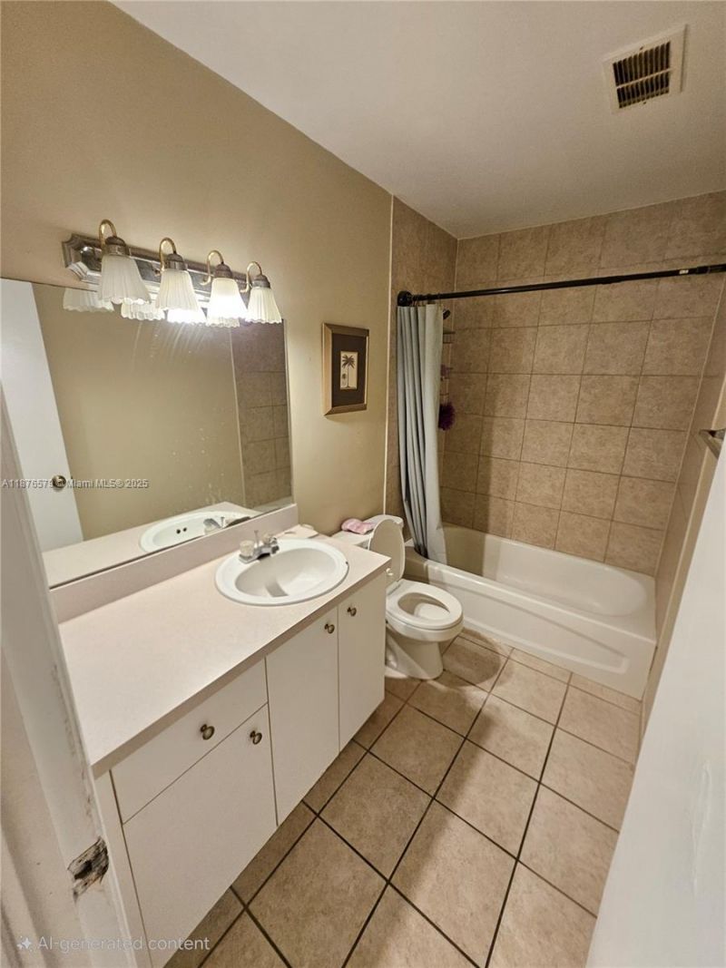 411 Executive Center Dr, Unit 209, West Palm Beach, FL 33401 Photo