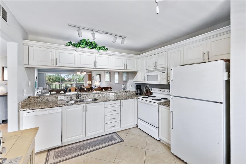 1001 Eastham Way, Unit C-206, Naples, FL 34104 Photo