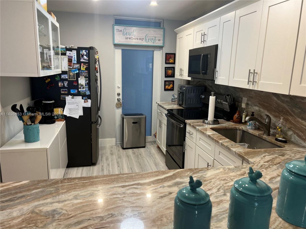 410 Golden Isles Dr, Unit 202, Hallandale Beach, FL 33009 Photo