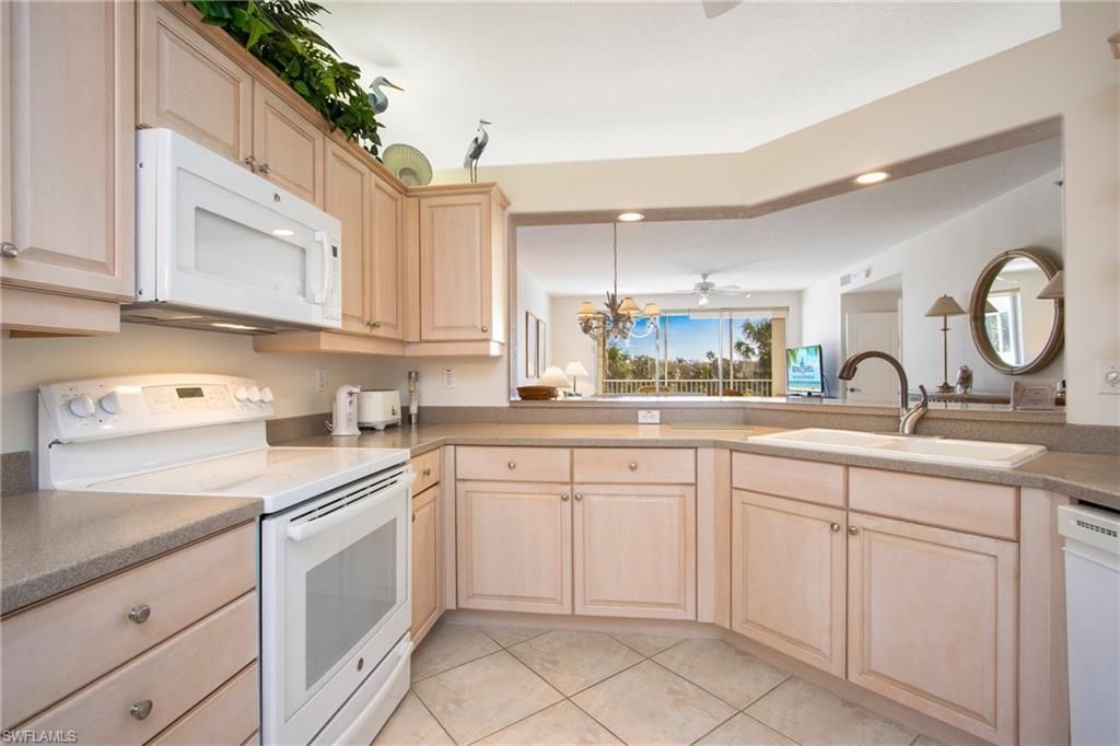 7655 Pebble Creek Cir, Unit 201, Naples, FL 34108 Photo