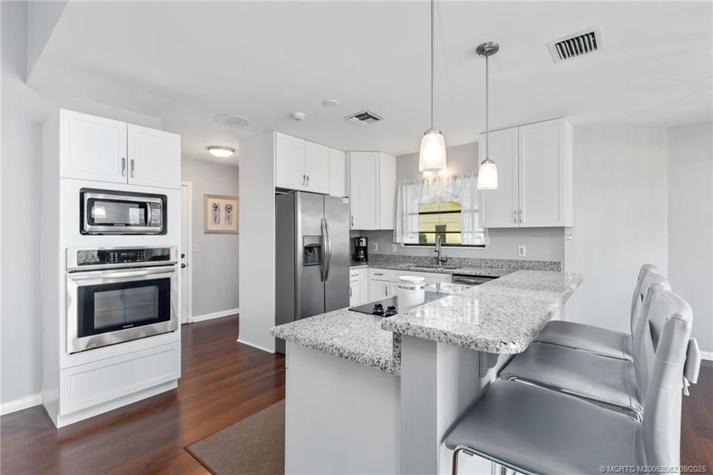 2108 NW Greenbriar Lane, Palm City, FL 34990 Photo