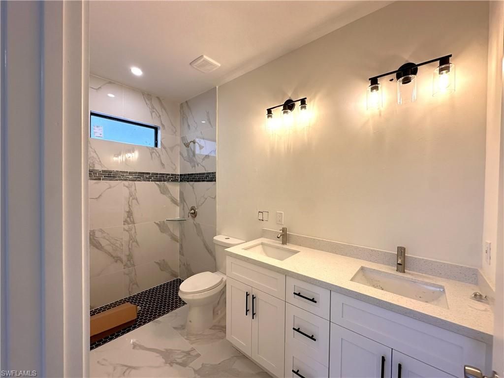 2404/2406 Dickens Ave N, Lehigh Acres, FL 33971 Photo