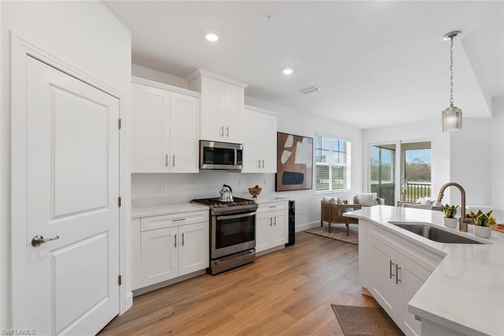 16889 Fairgrove Way, Unit 5-201, Naples, FL 34110 Photo