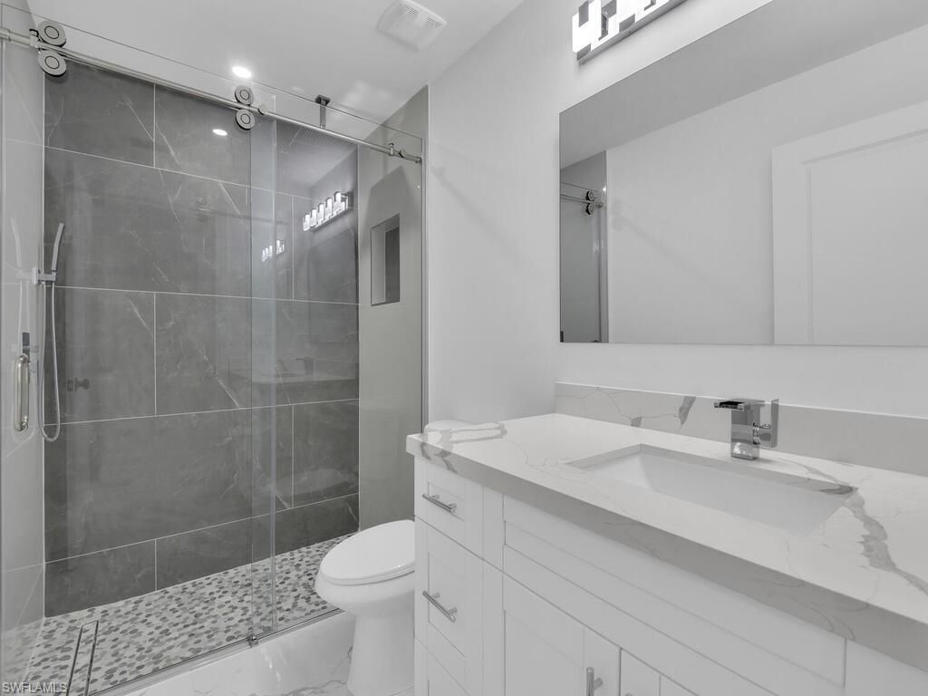 4913/4915 Leonard Blvd S, Lehigh Acres, FL 33973 Photo