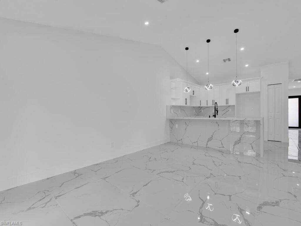 4913/4915 Leonard Blvd S, Lehigh Acres, FL 33973 Photo