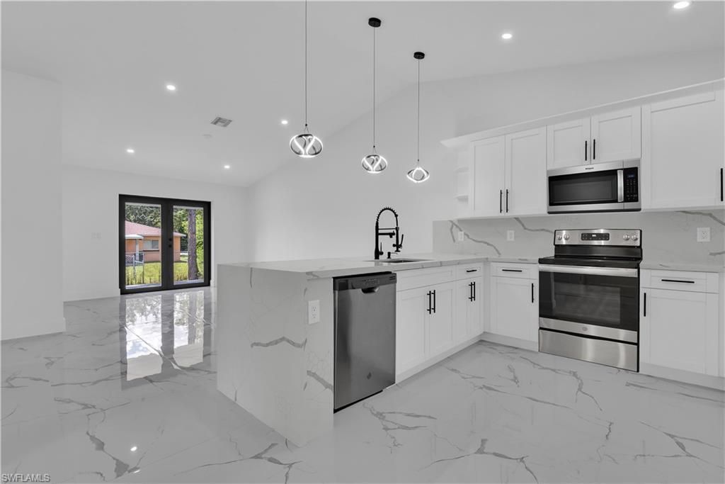 4913/4915 Leonard Blvd S, Lehigh Acres, FL 33973 Photo