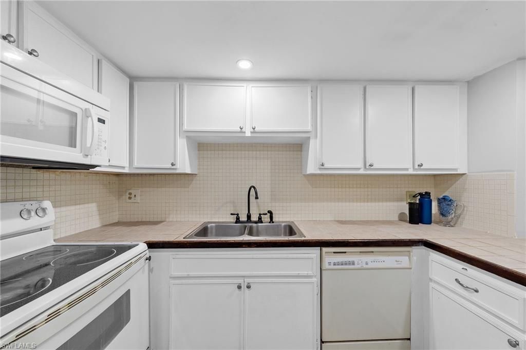 102 E Greens Blvd, Lehigh Acres, FL 33936 Photo