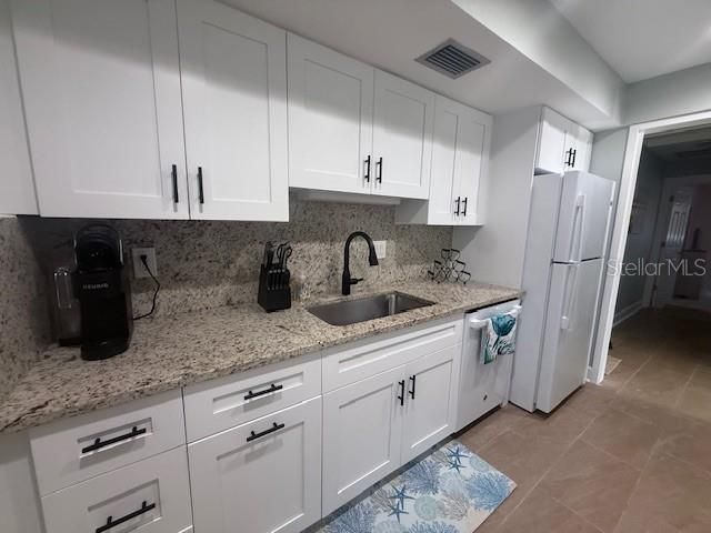 143 Whispering Sands Drive, Unit N/A, Sarasota, FL 34242 Photo