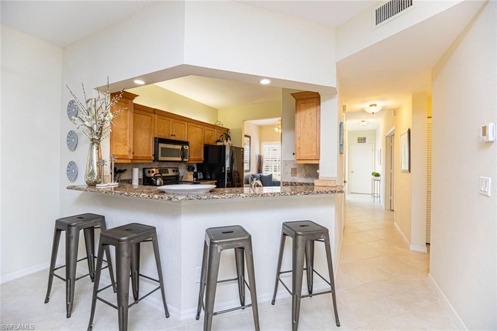 823 Tanbark Dr, Unit 101, Naples, FL 34108 Photo