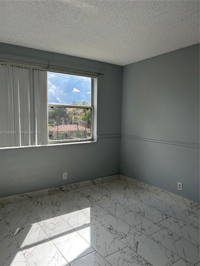 8801 Wiles Rd, Unit 306, Coral Springs, FL 33067 Photo